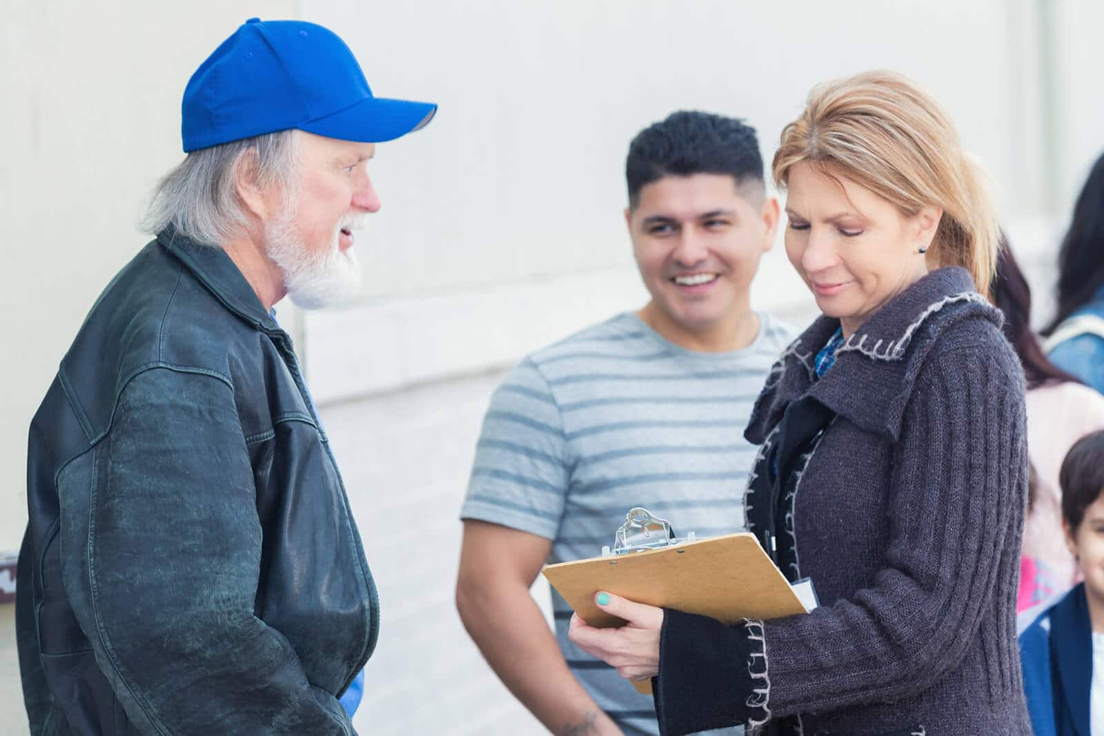 Food bank volunteer helps homeless man